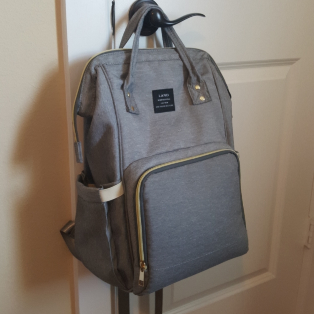 Backpack/diaper bag w/ changing pad